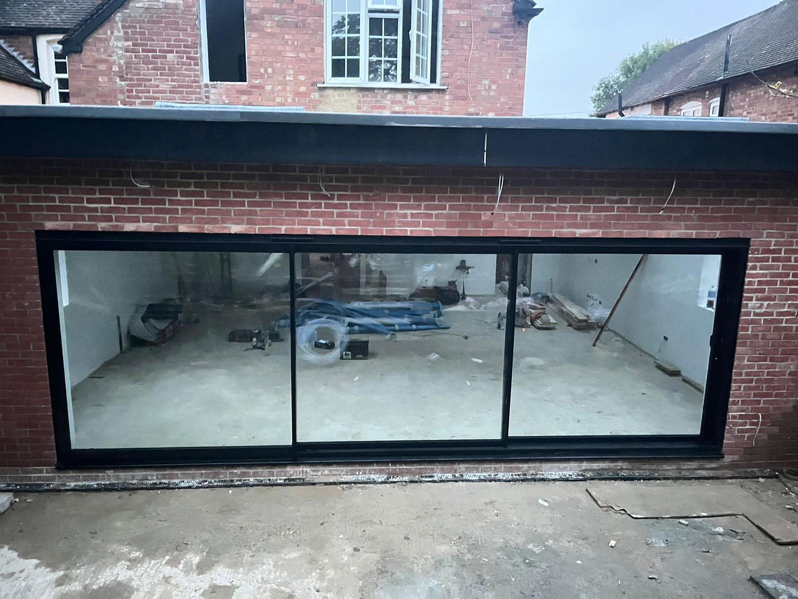 Three-Panel Slimline Sliding Doors, installed in North West, July 2026