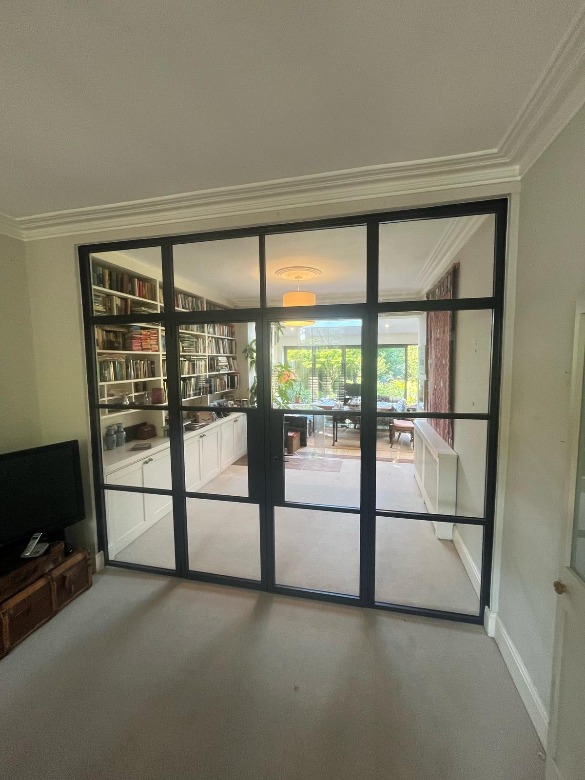 Steel-look internal doors opening to a library snug — Steel Look Internal Doors by Windows in the Lakes