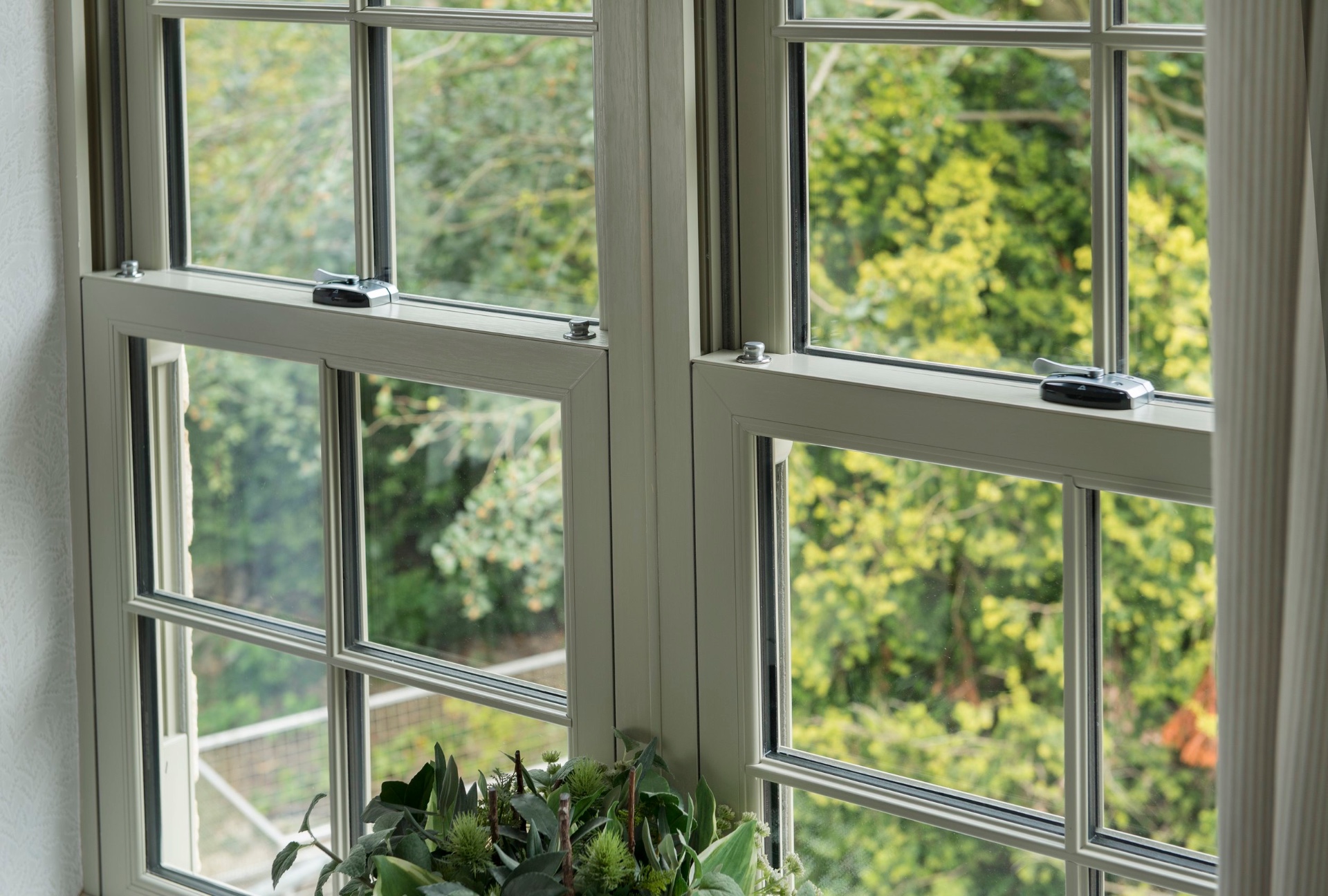 Timber look vertical sliding sash windows in heritage cream