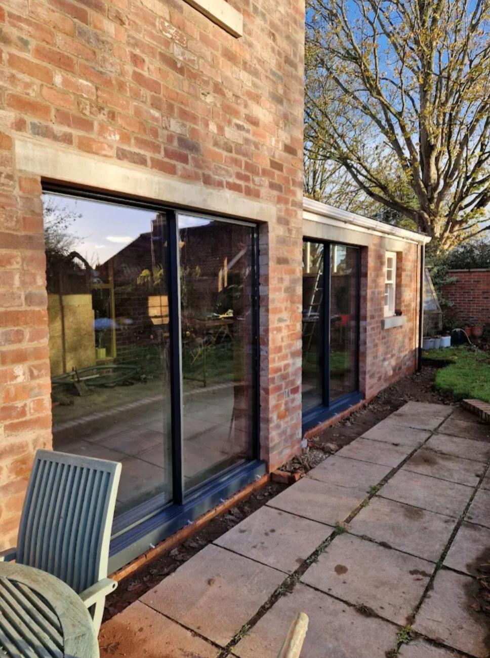 Slimline Sliding Doors, Brick Courtyard, installed in North West, June 2026