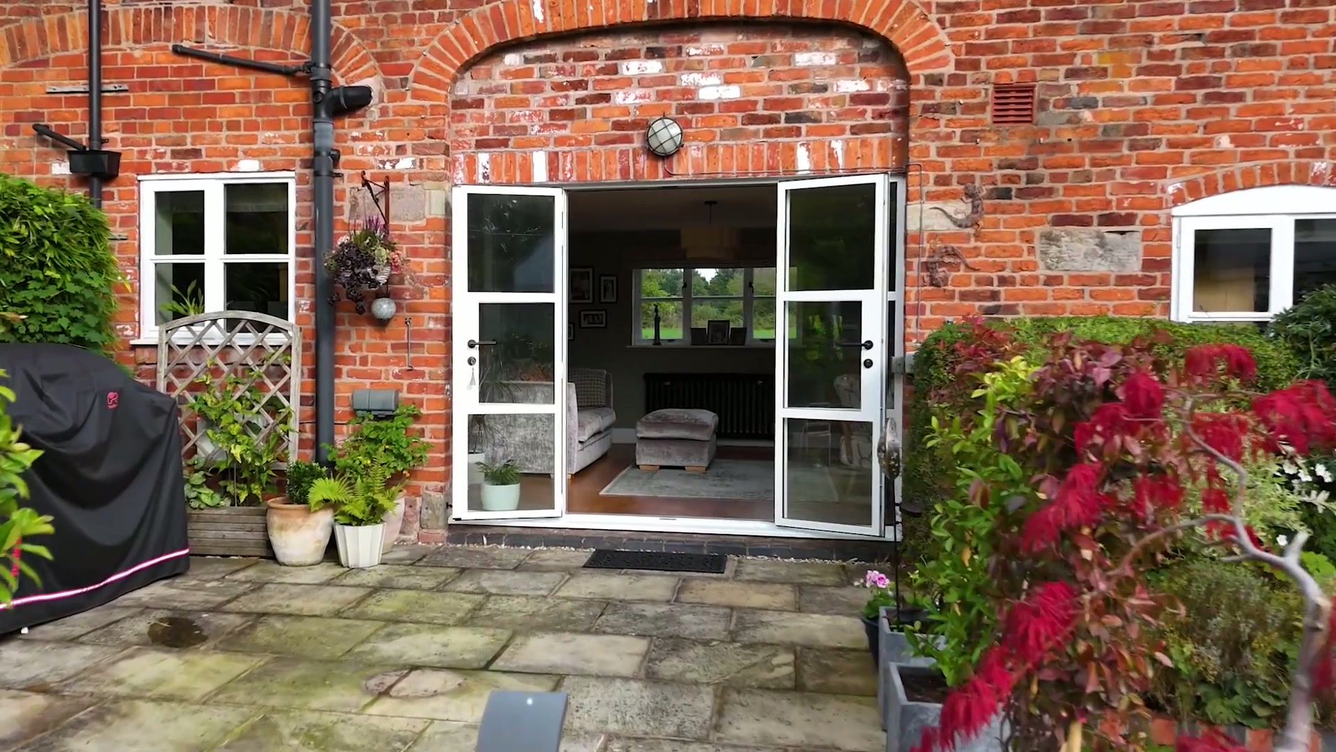 A Brick Barn Range, Opened to the Courtyard — still from the project film
