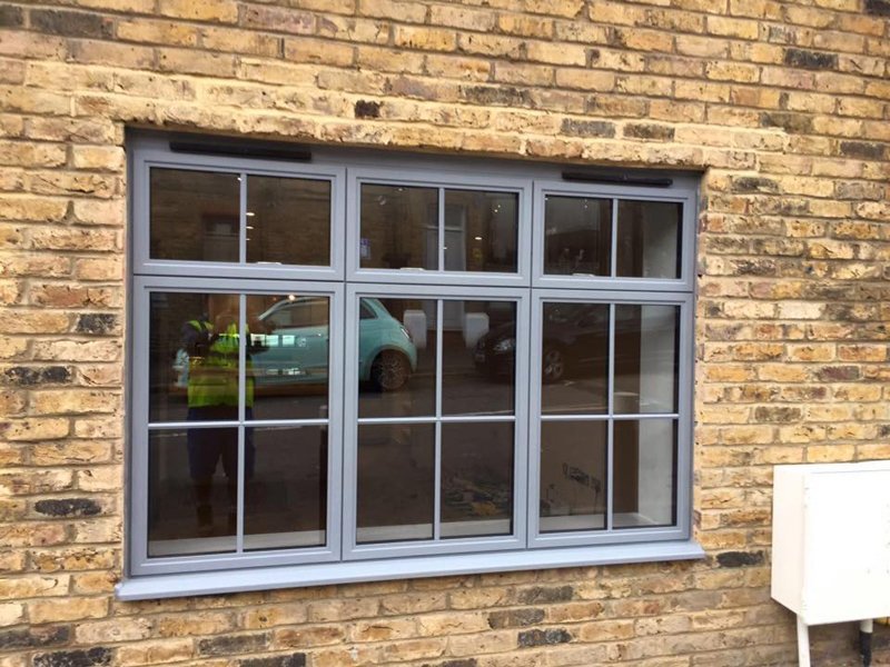 Aluminium window with Georgian bars in a brick elevation
